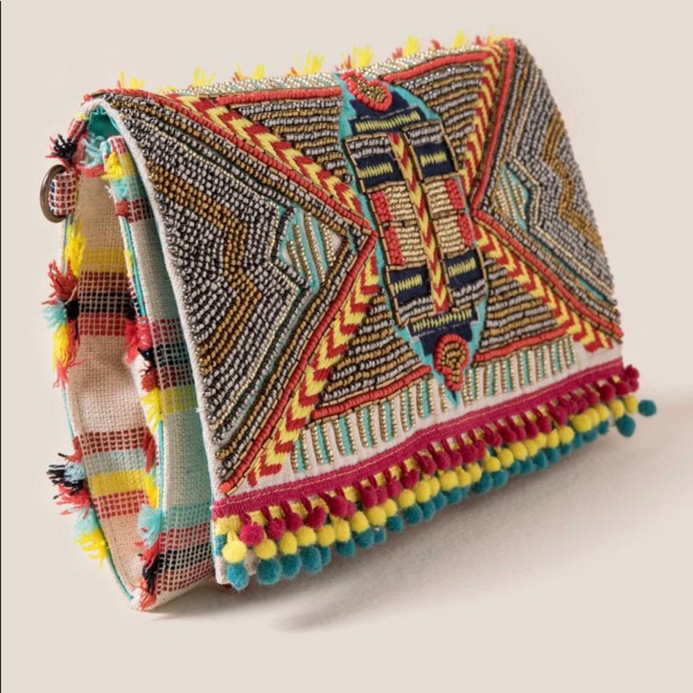Francesca’s Beaded Pom Clutch